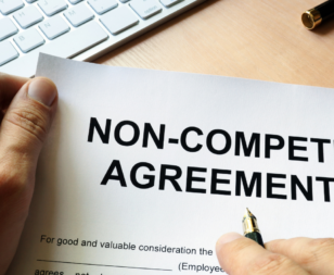 Person holding non-compete agreement