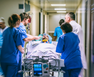 Emergency department staff working on patient