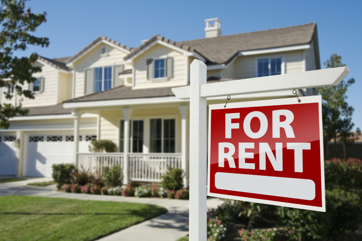 For rent sign in front of residential home