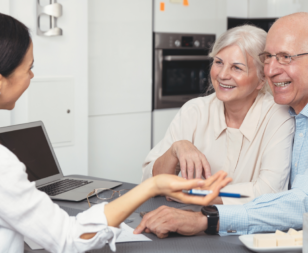 older couple having a meeting with woman